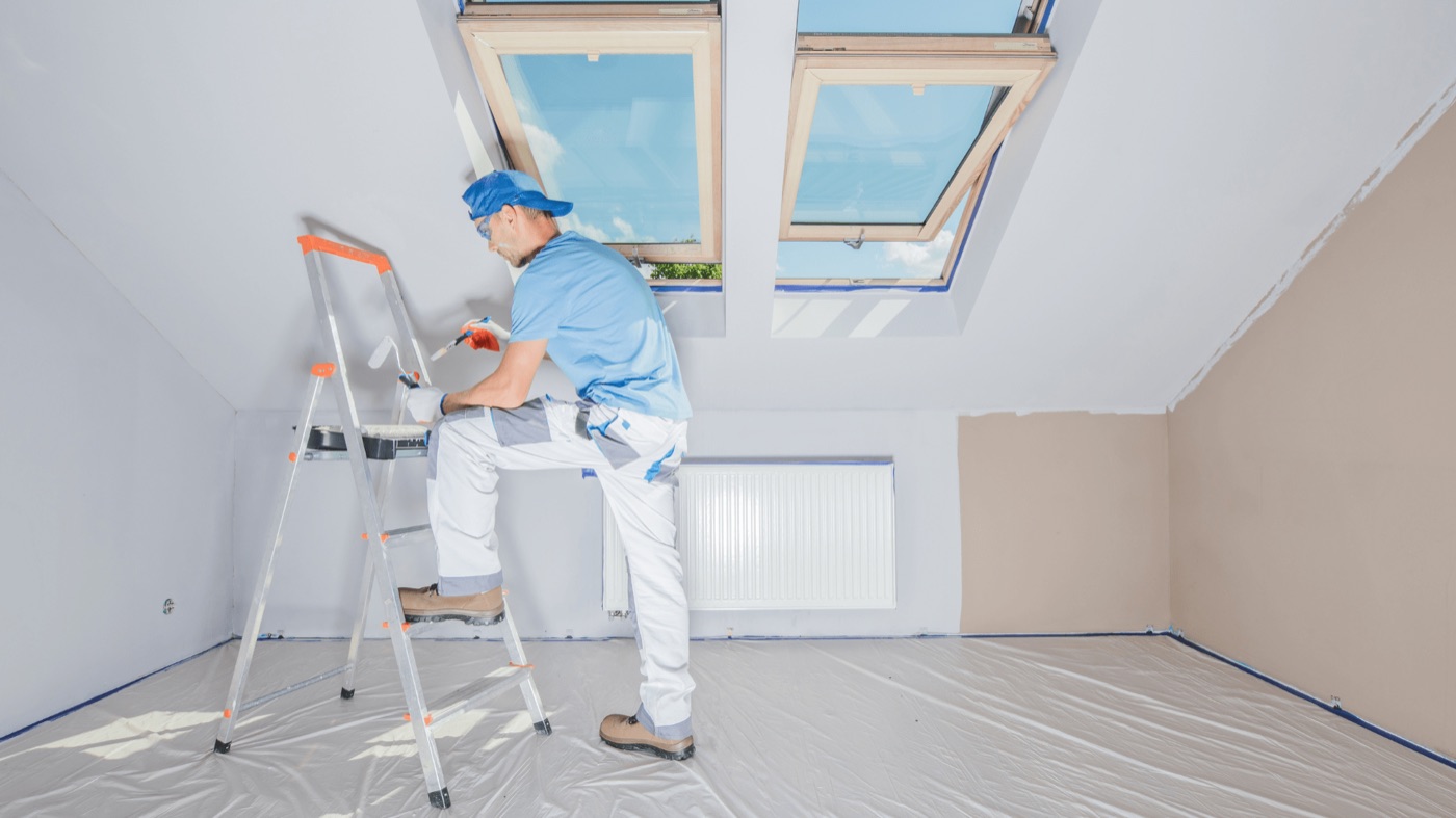 A painter refreshing the interior of a Miami home
