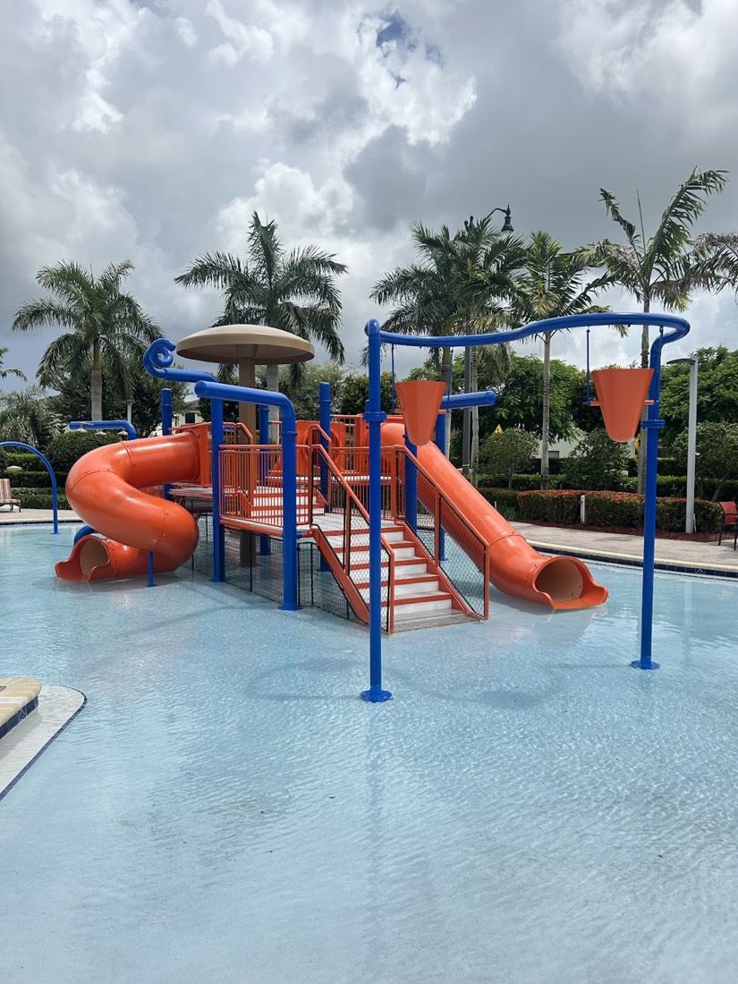 Repainted community pool playground in vibrant colors, Miami